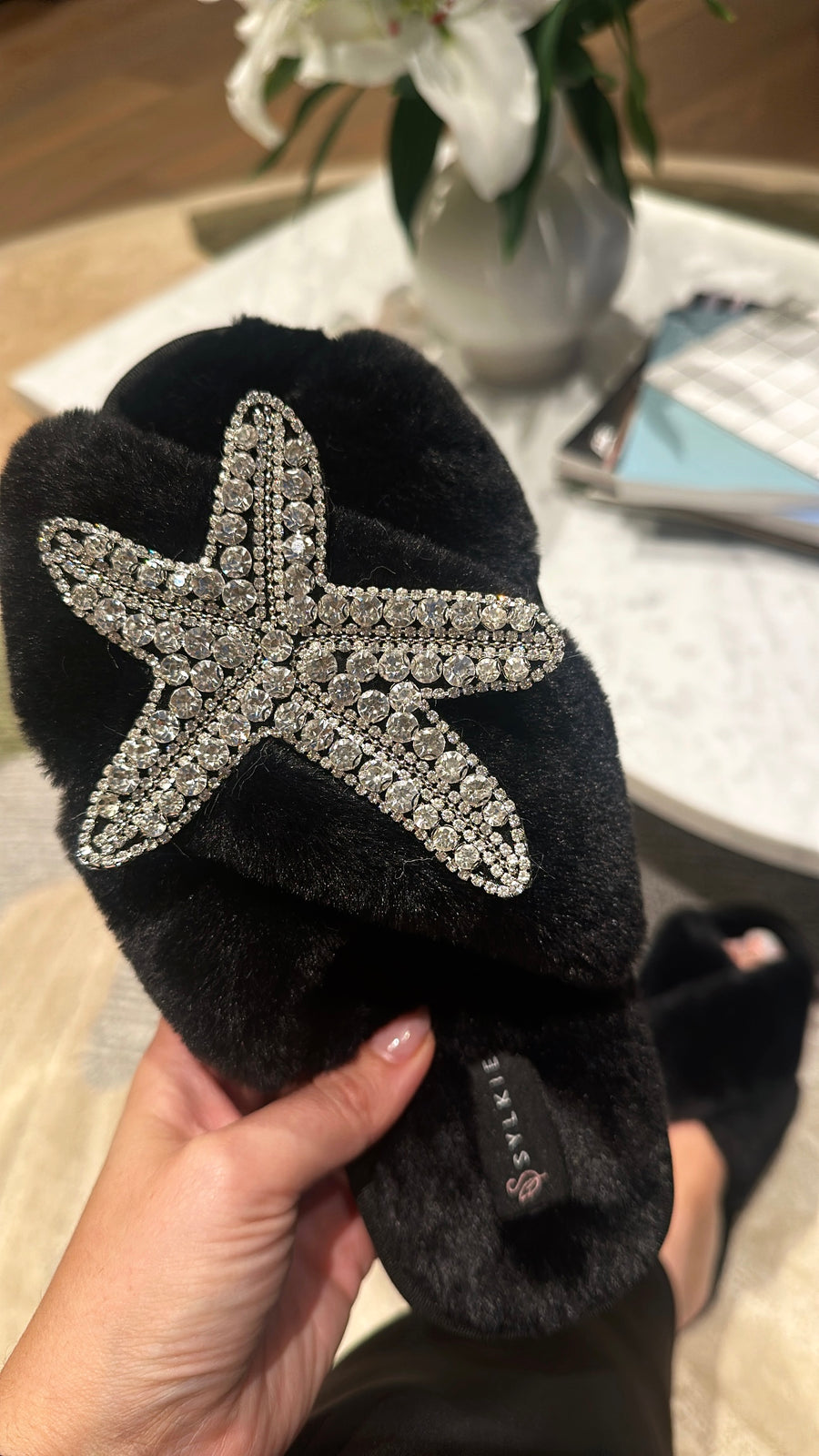 Slipper with brooch