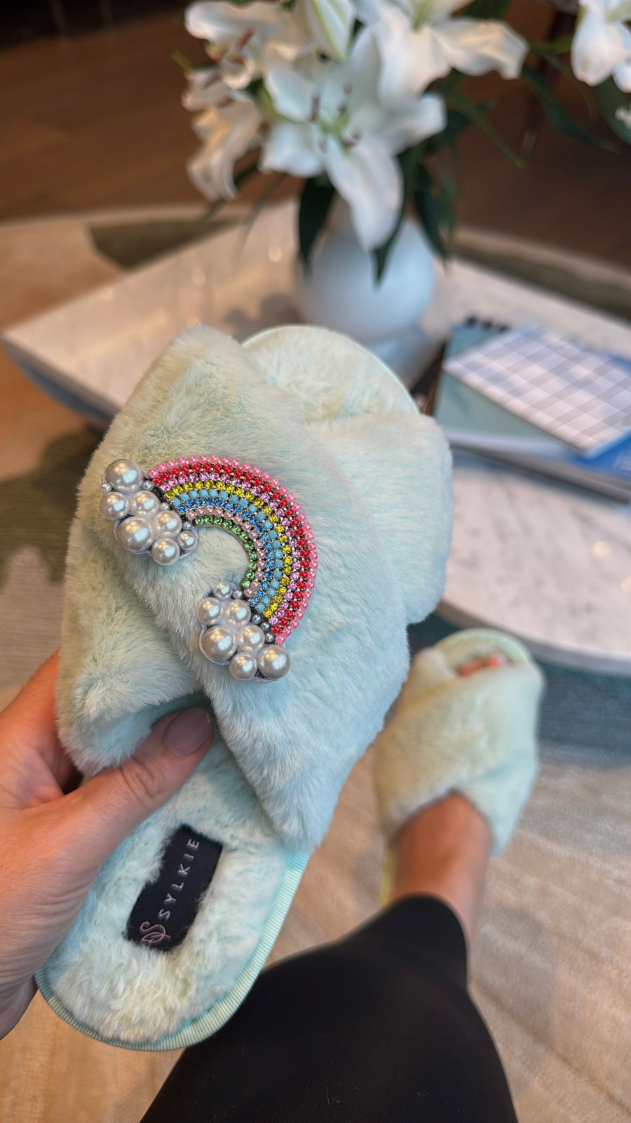 Slipper with brooch