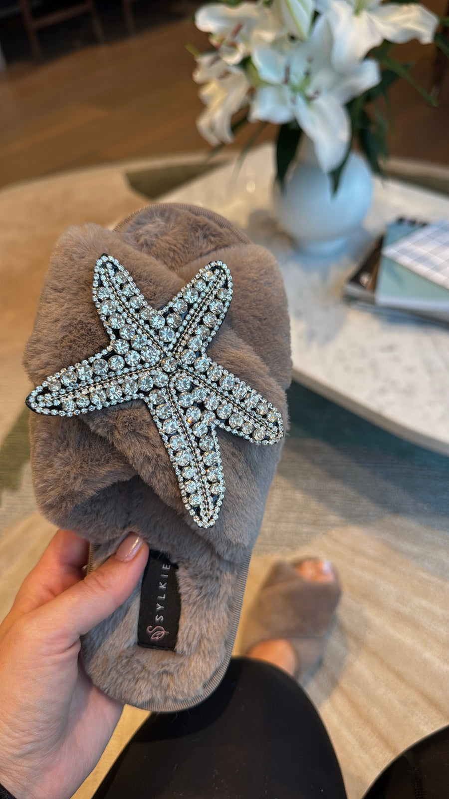 Slipper with brooch