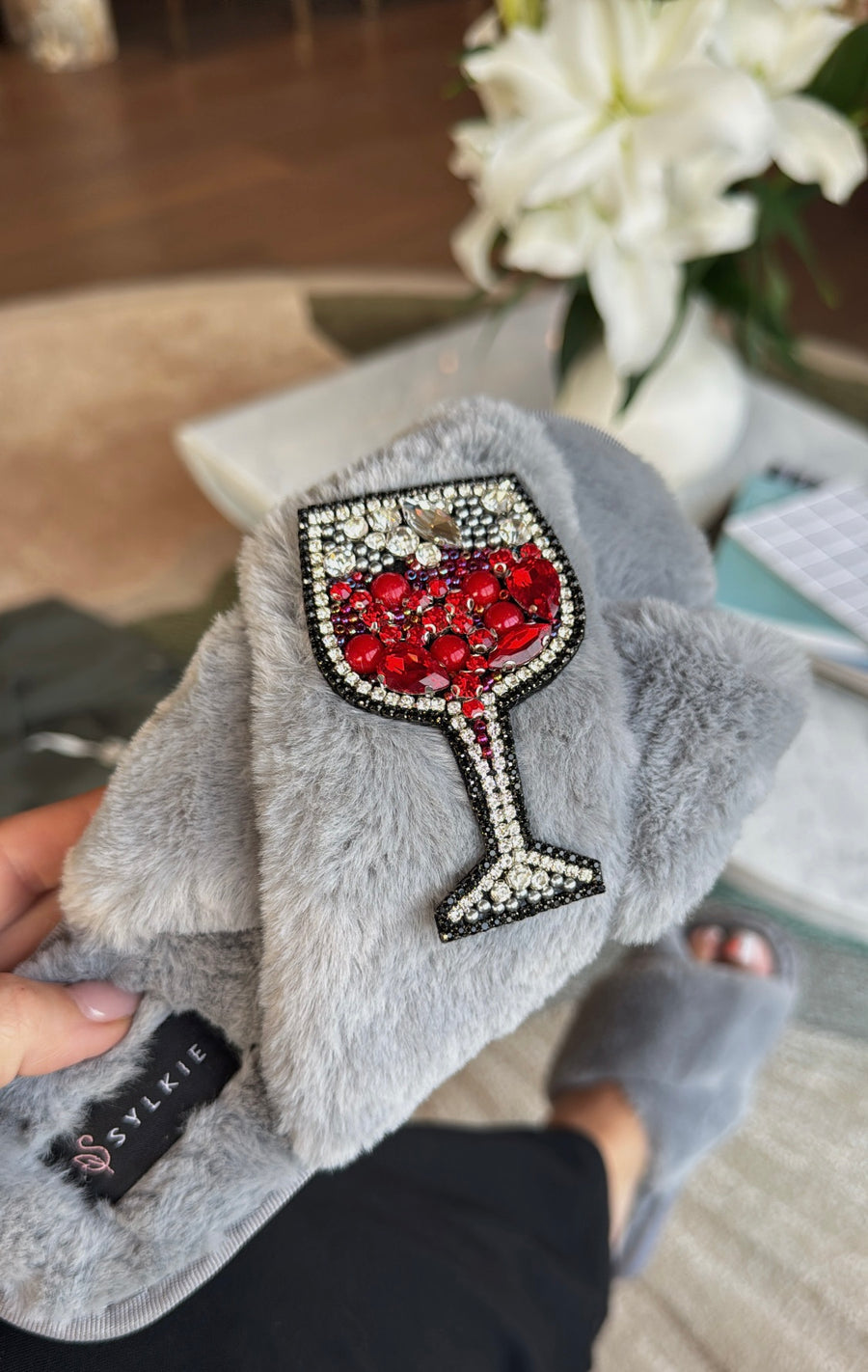 Slipper with brooch