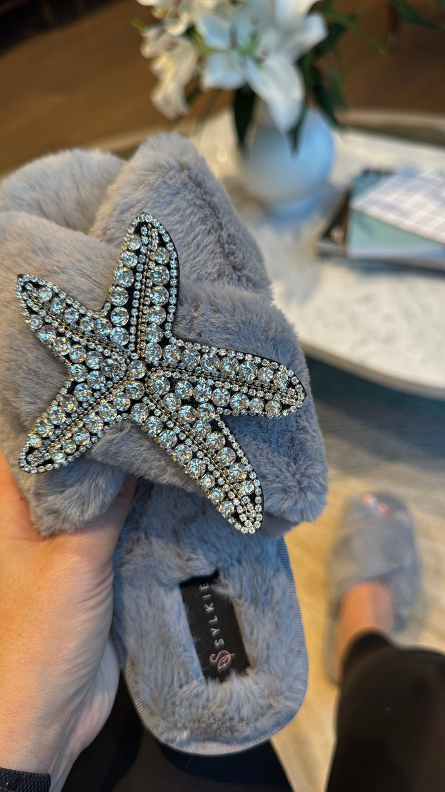 Slipper with brooch