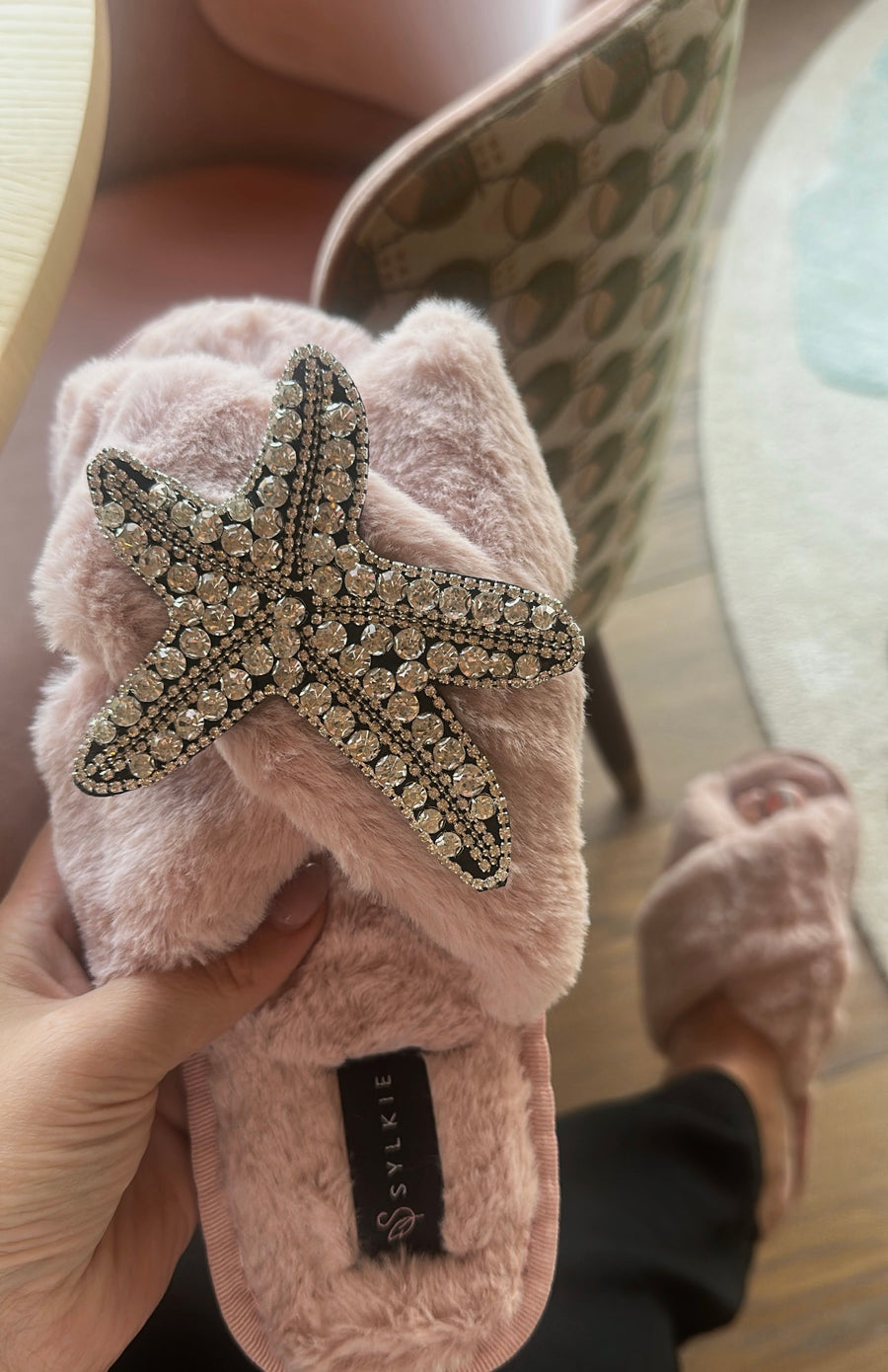 Slipper with brooch