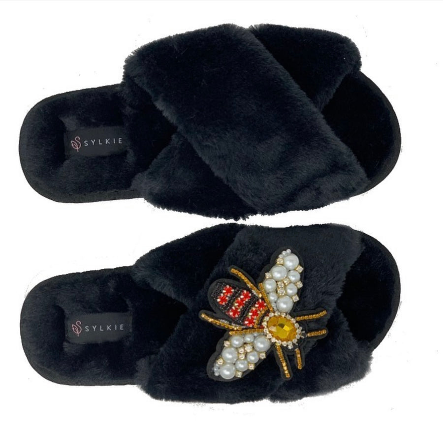 Slipper with brooch