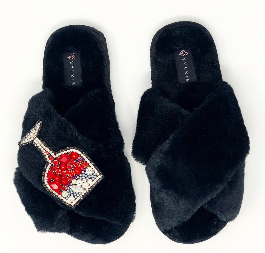 Slipper with brooch