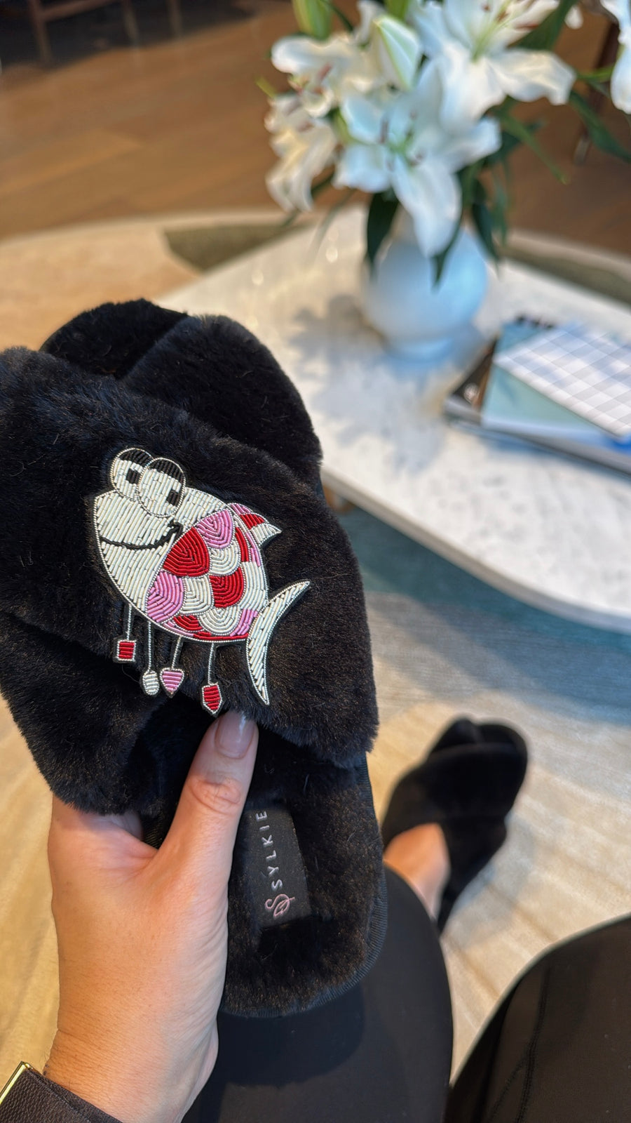 Slipper with brooch