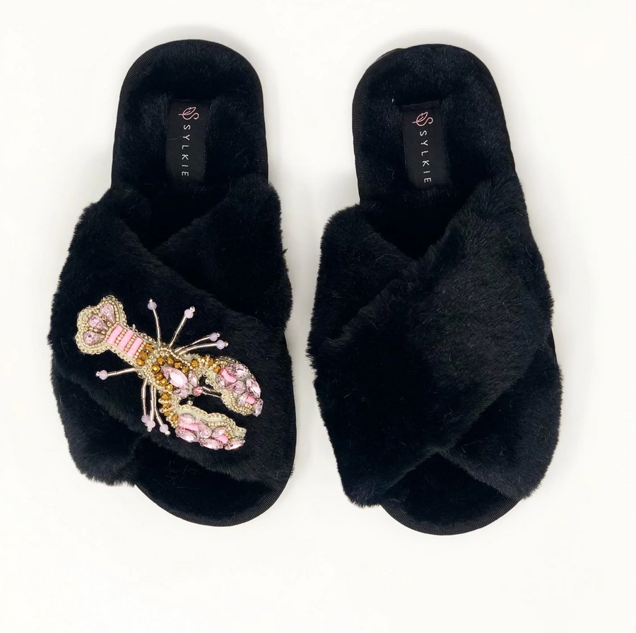 Slipper with brooch