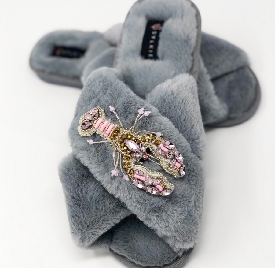 Slipper with brooch