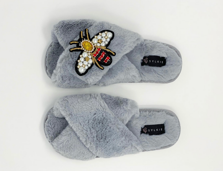 Slipper with brooch