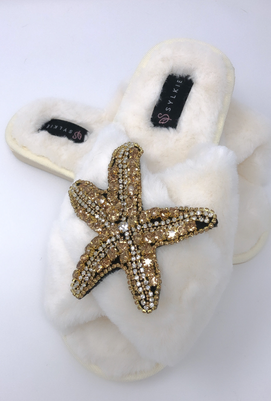 Slipper with brooch