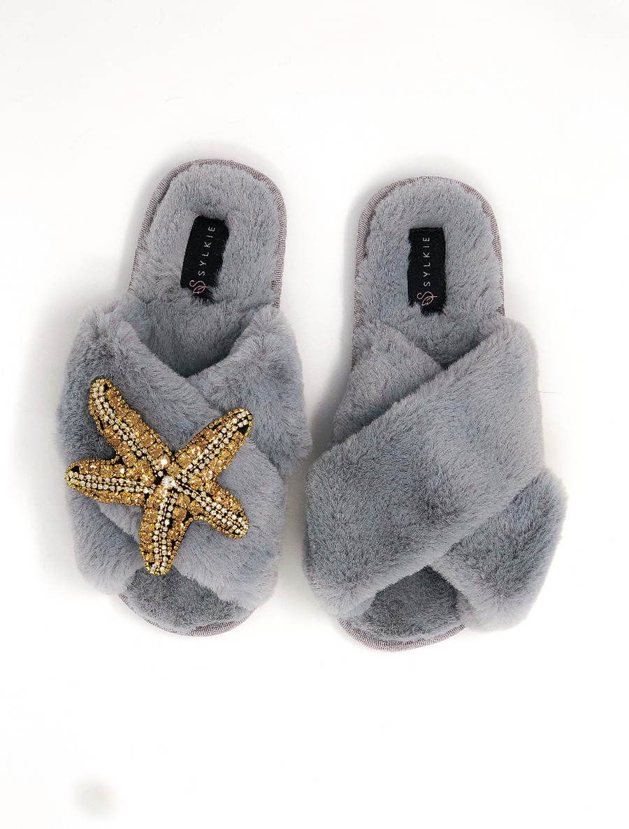 Slipper with brooch
