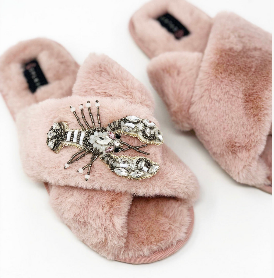 Slipper with brooch