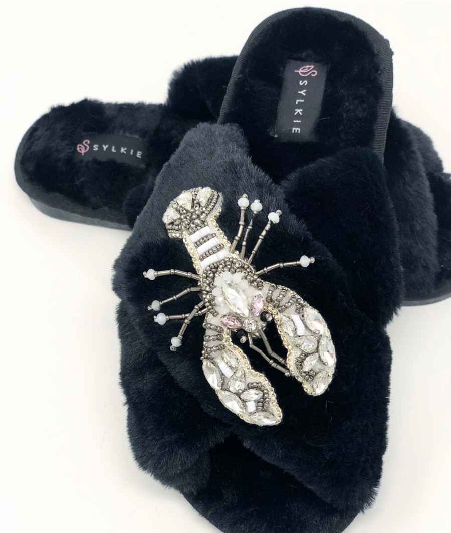 Slipper with brooch